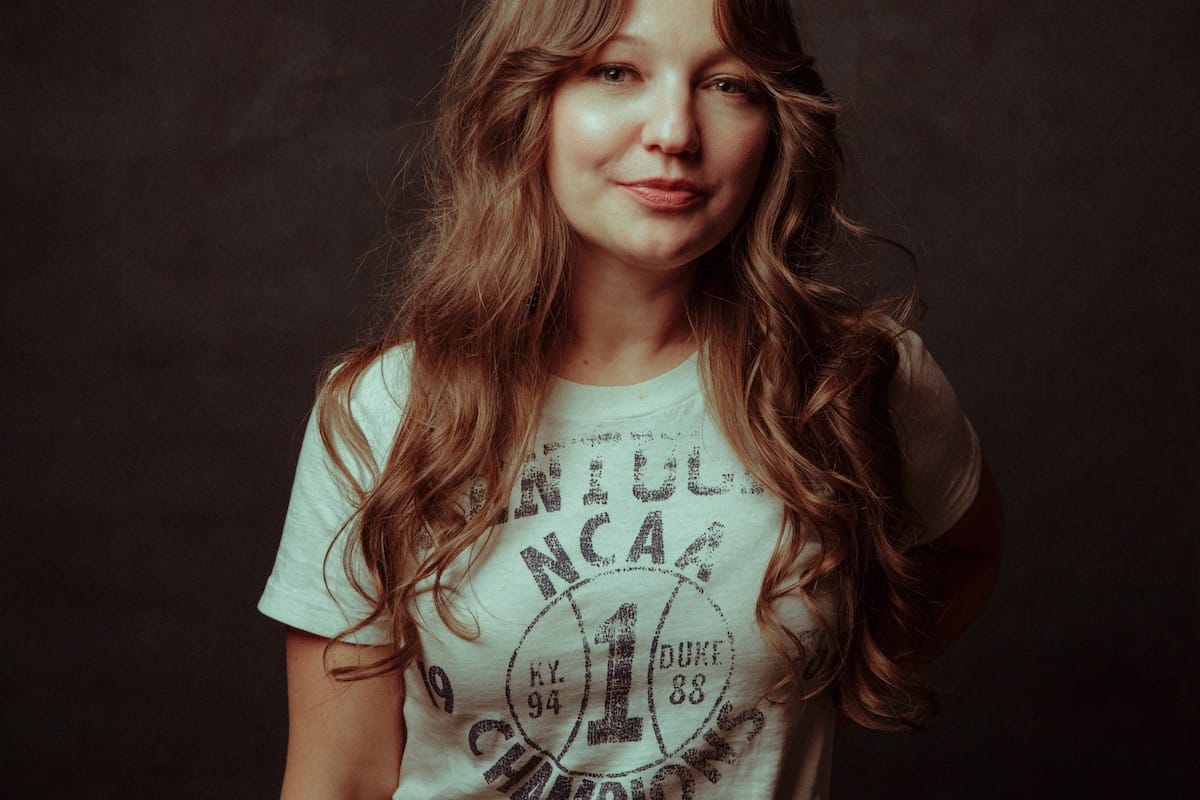 Portrait of Kelsey Waldon in a black and white sports T-shirt