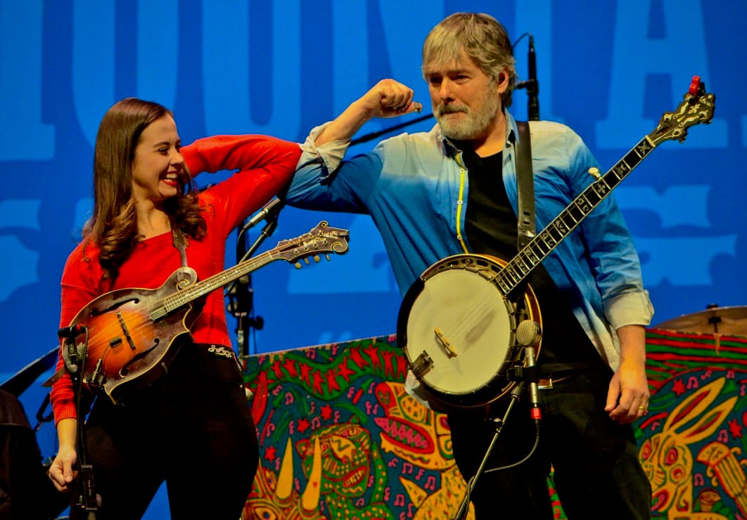 Bela Fleck and Sierra Hull bump elbows onstage