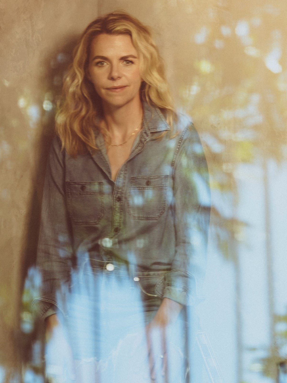 Aoife O'Donovan seen through a pane of glass