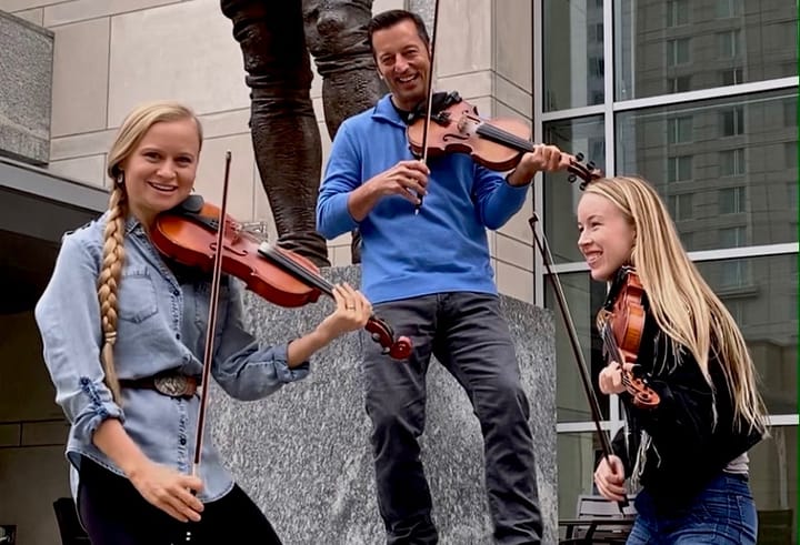 THROUGH THE LENS: Bluegrass Rules Inside or Out at IBMA's Big Event